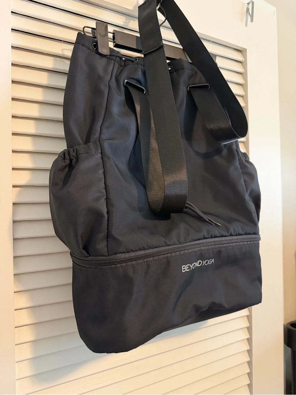 Beyond Yoga Black Drawstring Backpack with Lower Zip Compartment